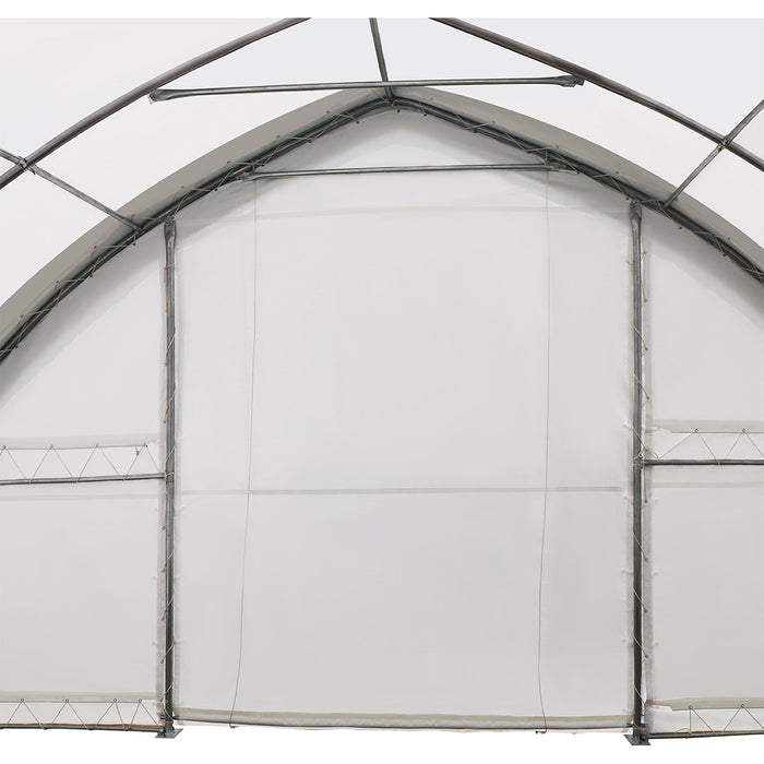 TMG-ST3082E 30x80 peak ceiling storage shelter with heavy duty 11 oz PE cover, galvanized steel frame, and drive-through roll-up doors for large equipment storage