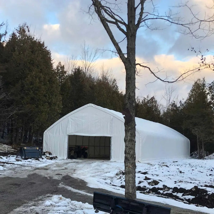 TMG Industrial 30' x 70' Straight Wall Peak Ceiling Storage Shelter with Heavy Duty 17 oz PVC Cover & Drive Through Doors, TMG-ST3070V